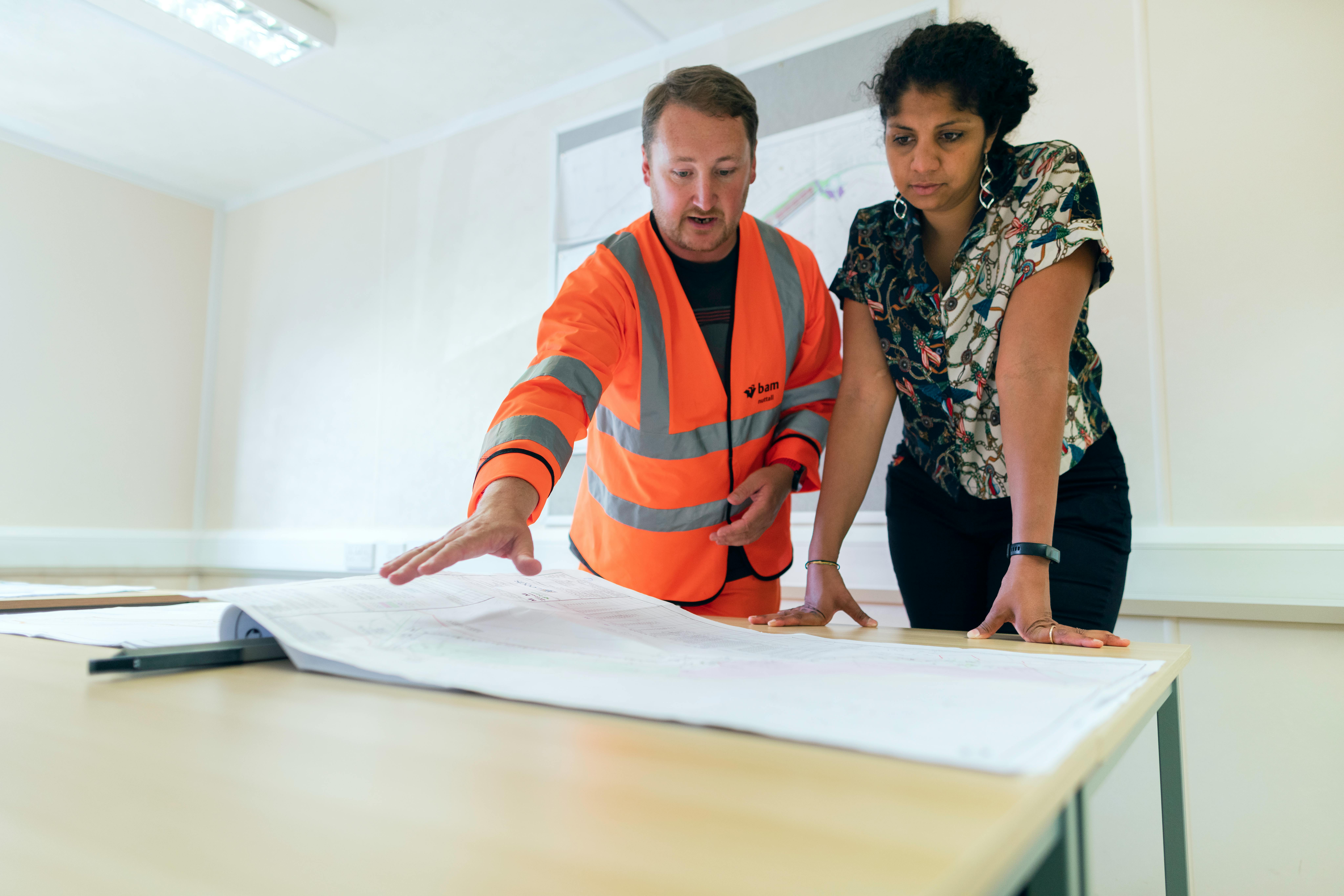 Engineers reviewing structural drawings and calculation information for Building Control